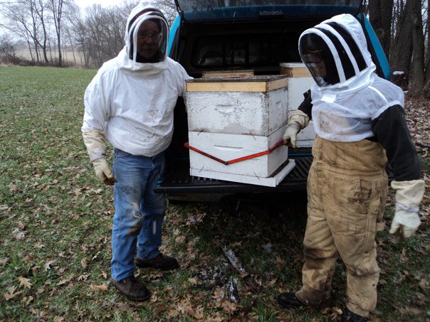 Russ and John showing parts of a hive.